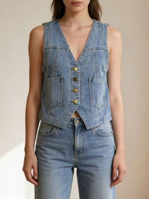 Light blue denim button-down vest with brass buttons and cropped length
