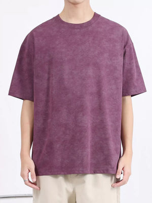Men's relaxed fit t-shirt in purple with a washed effect, crew neck, and short sleeves.
