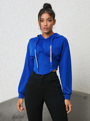 Royal blue cropped hoodie with corset detail and rhinestone drawstrings