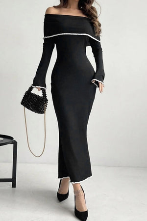 Black off-shoulder maxi dress with ruffled trim and long sleeves.