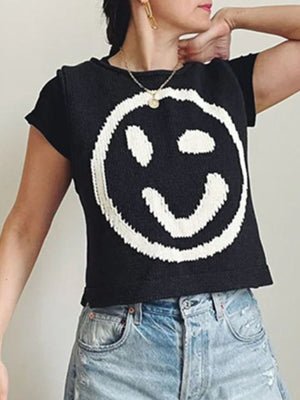Black knit tank top with white smiley face graphic and short sleeves.