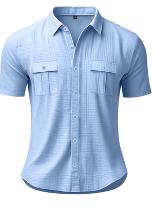 Light blue short sleeve button-down shirt with two chest pockets and a collared neckline.