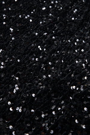 Black sequin mini skirt with body-hugging fit and textured fabric.