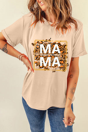 Tan cotton graphic tee with leopard print "Mama" text, short sleeves, and a crew neck.