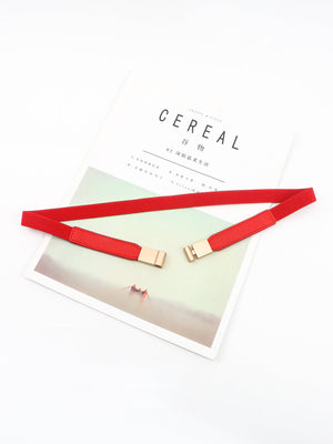 Red elasticated buckle belt with gold-tone alloy buckle and leather detail