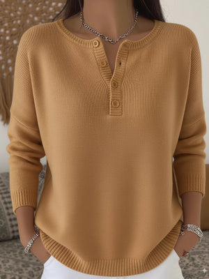 Buttoned long-sleeve knit top in brown with a henley neckline and ribbed cuffs.
