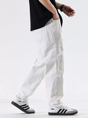Men's white cotton jeans with a relaxed fit and pocket detail.