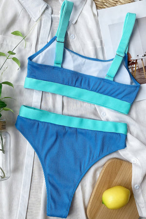 Ribbed high-waist bikini set in sky blue with aqua trim and straps.
