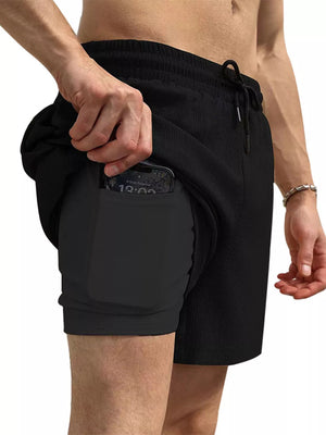 Men's black drawstring shorts with built-in phone pocket and liner.