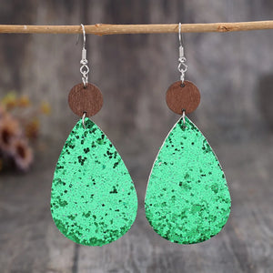 Emerald glitter teardrop earrings with wood accents and silver hooks