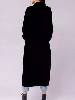 Black velvet longline trench coat with draped silhouette