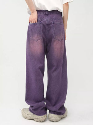 Men's wide-leg jeans in mauve with gradient wash detail and relaxed fit.