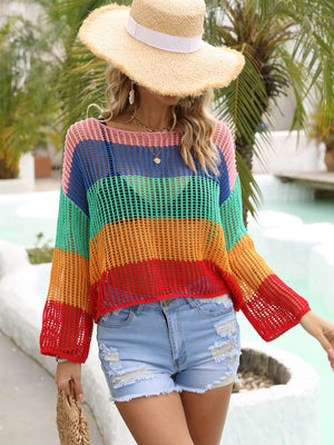 Rainbow mesh cover-up with flared sleeves and a relaxed fit, styled with denim shorts.
