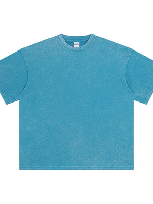 Oversized teal acid wash t-shirt with crew neck and short sleeves.