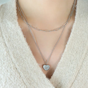 Silver layered necklace with paperclip chain and heart pendant with star detail
