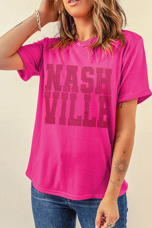 Hot pink t-shirt with rolled sleeves and Nashville graphic print