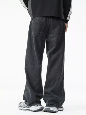 Men's dark wash cotton wide-leg jeans with two back pockets.