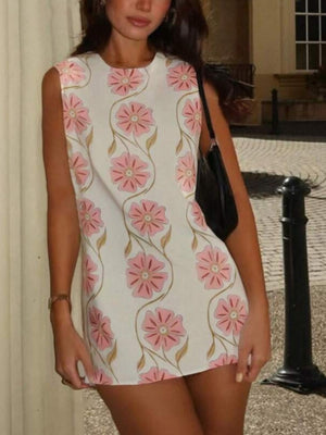 Delicate floral mini dress in Dusty Pink with a high neckline and sleeveless cut.