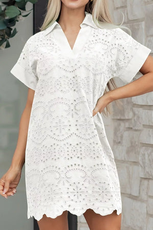 White eyelet embroidered cotton mini dress with V-neck and short sleeves