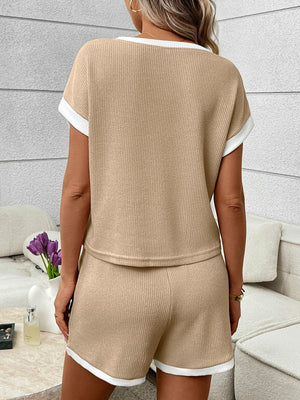Khaki ribbed knit two-piece set with white trim, featuring short sleeves and shorts.