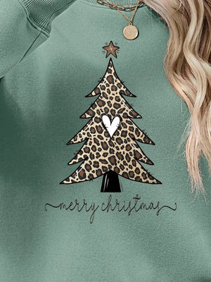 Sage green sweatshirt with leopard print Christmas tree graphic and Merry Christmas text