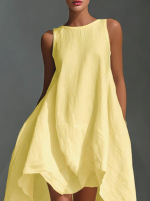 Yellow sleeveless high-low hem dress with a round neckline and textured fabric.
