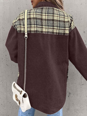 Brown denim jacket with plaid paneling on shoulders, buttoned front, casual styling.