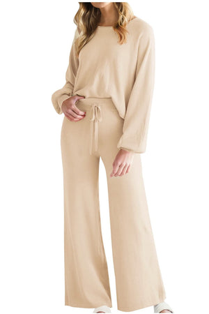 Tan loungewear set with crewneck, balloon sleeves, wide-leg pants, and drawstring waist.