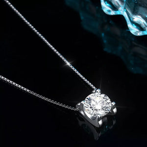 Dazzling moissanite pendant necklace in silver with a delicate chain.