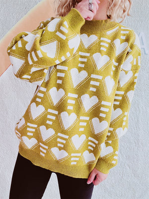 Mustard acrylic knit jumper with white geometric heart pattern, crew neck, long sleeves.