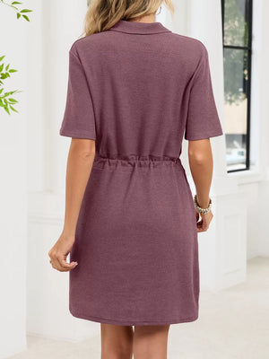Textured polo dress in Pink with short sleeves and adjustable drawstring waist.