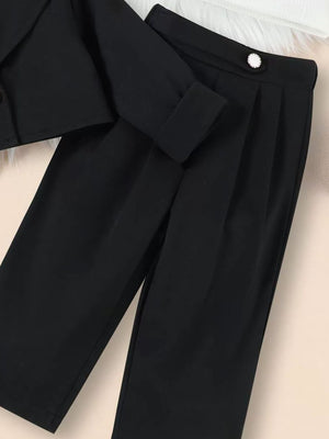 Toddler black blazer set with cropped jacket and pleated pants.