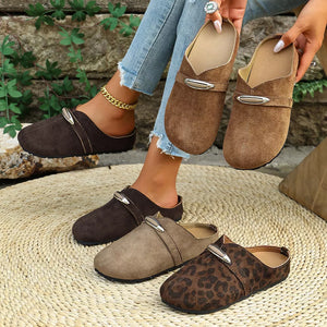 Chic round toe slip-on flats in brown, beige, and leopard print with metal buckle detail.