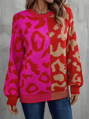 Split leopard knit sweater with statement balloon sleeves in rose/red and pink.