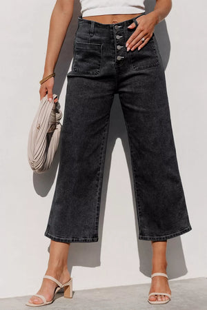 Dark wash denim wide-leg jeans with button-fly and front pockets.