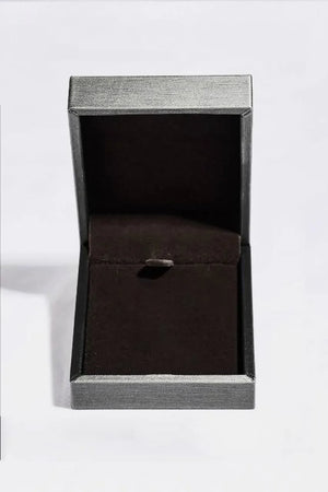 Delicate Orb Chain Necklace jewelry box, silver and black textured exterior, dark interior.