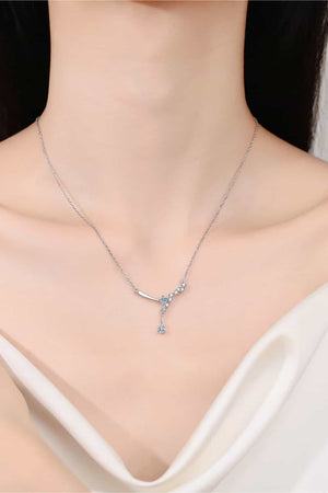 Silver asymmetrical moissanite cluster pendant necklace with a delicate chain.