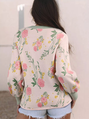 Floral V-neck knit sweater with relaxed fit and green trim