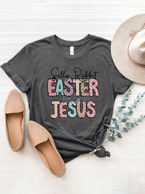 Dark gray Easter graphic tee with pastel polka dot text that reads "Silly Rabbit EASTER is for JESUS".