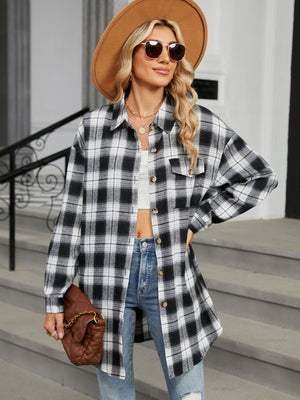 Oversized black and white plaid shacket with button front and chest pockets.