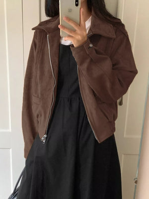 Brown zip-up long-sleeve jacket with a collared neckline and buttoned cuffs.