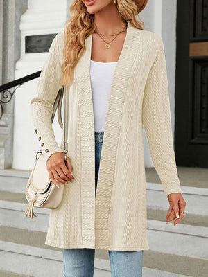 Textured knit longline cardigan in tan with button details on the sleeves.