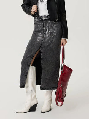 Black distressed denim maxi skirt with high slit and buttoned waist.