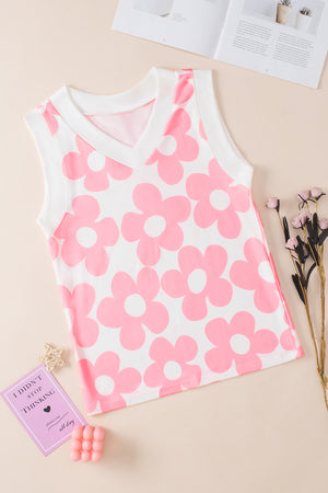 Floral pop V-neck sleeveless top in blush pink with a white contrast trim and allover flower print.