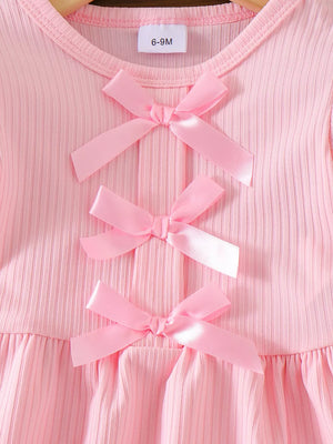 Children's Ribbed Bow Top And Shorts Set in Pink, close-up detail
