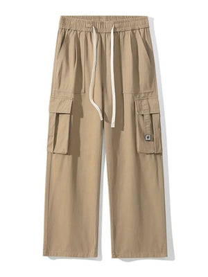 Khaki cotton wide-leg cargo sweatpants with drawstring waist and multiple pockets.