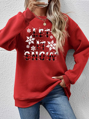 Red crewneck sweatshirt with "Let It Snow" graphic and snowflakes.