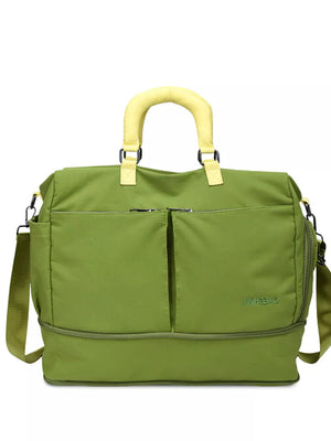 Green travel organizer bag with yellow handles and adjustable strap, featuring multiple pockets.