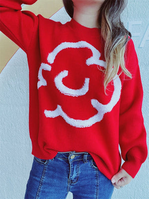 Red acrylic sweater with white cloud intarsia pattern, crew neck, long sleeves.