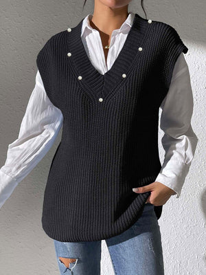 Black ribbed knit sleeveless V-neck vest with pearl embellishments.